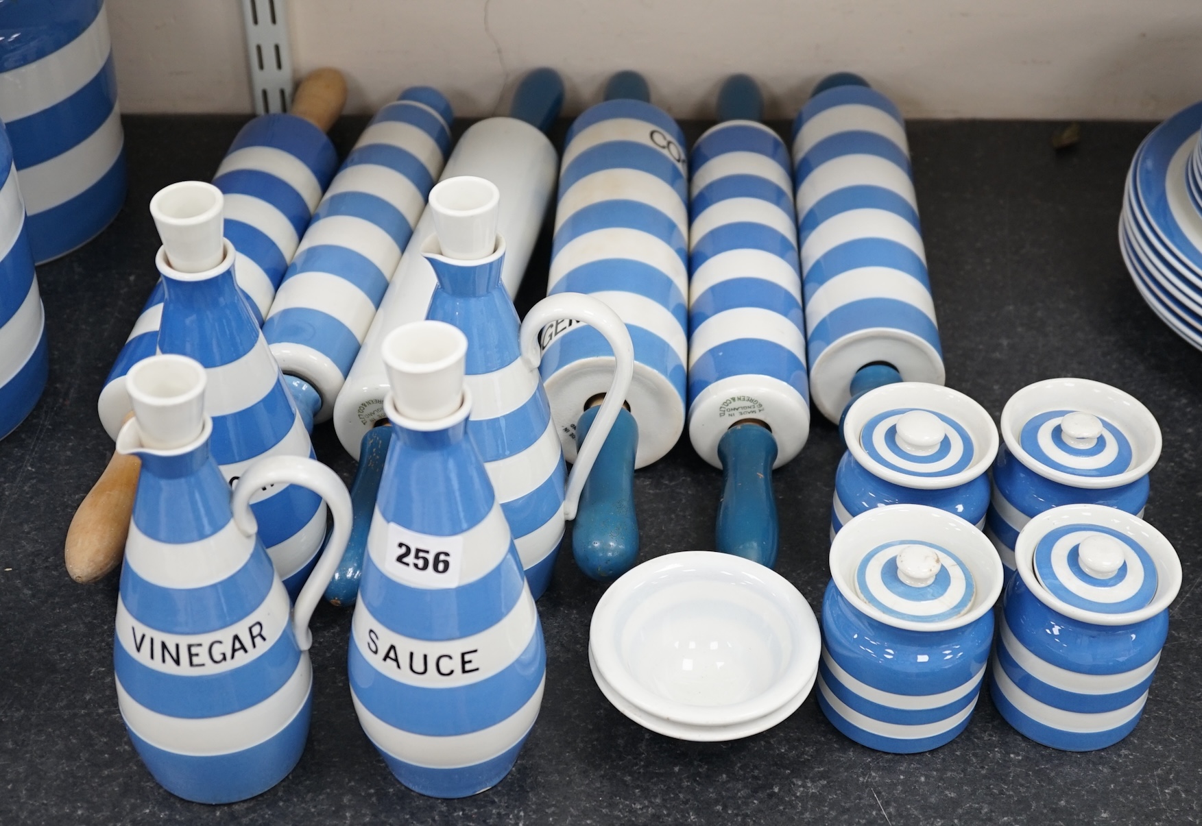 T.G.Green Cornish Kitchenware, six rolling pins one marked Cocogem but four unbranded, four Vinegar, Sauce and oil bottles, four small unnamed lidded storage jars and two egg separators mainly Green Shield marks. Conditi